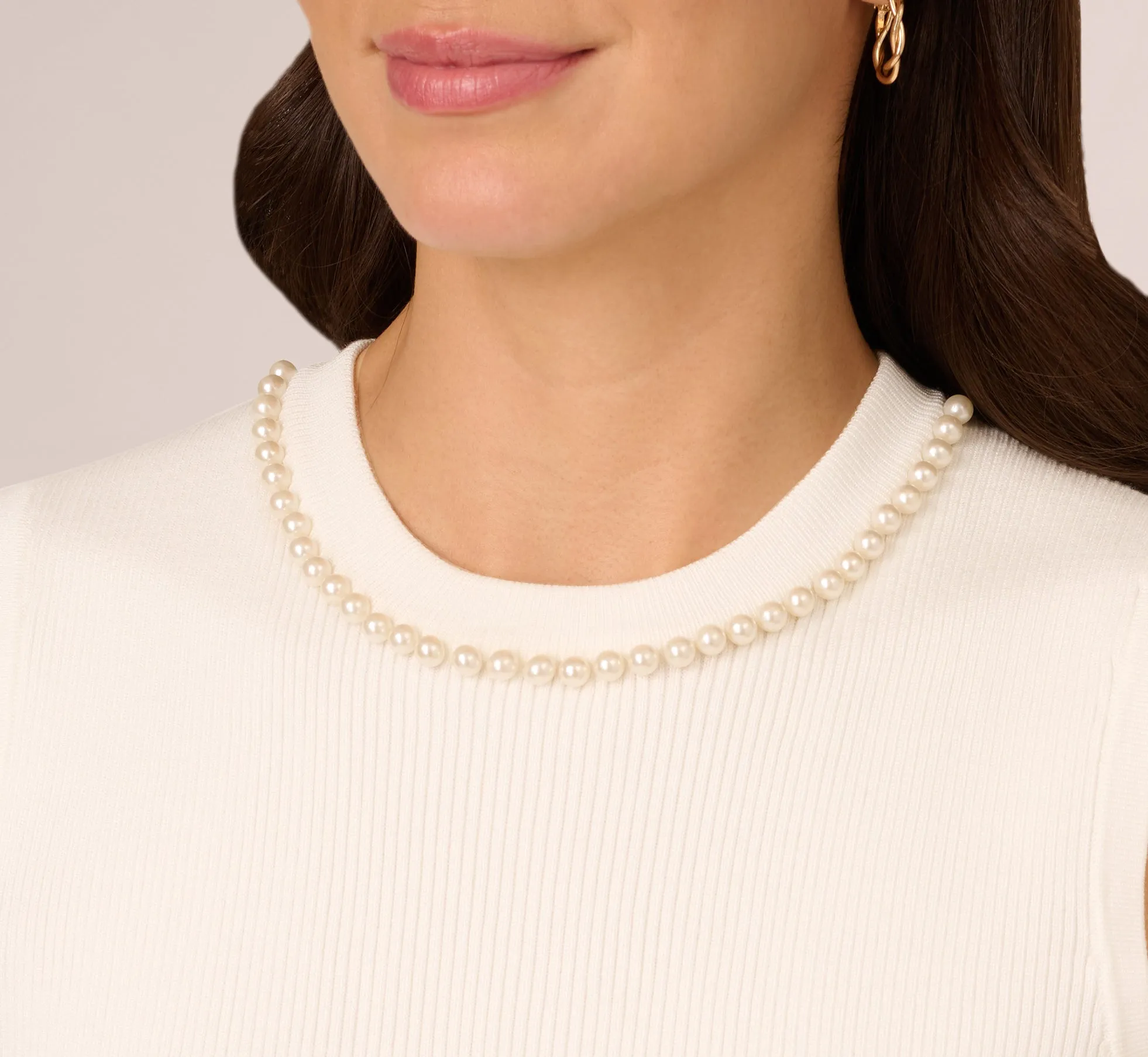 Sleeveless Pearl Neck Sweater In Ivory